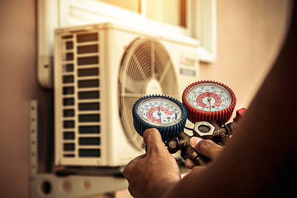 Professional Hvac technician working in The Rock, GA